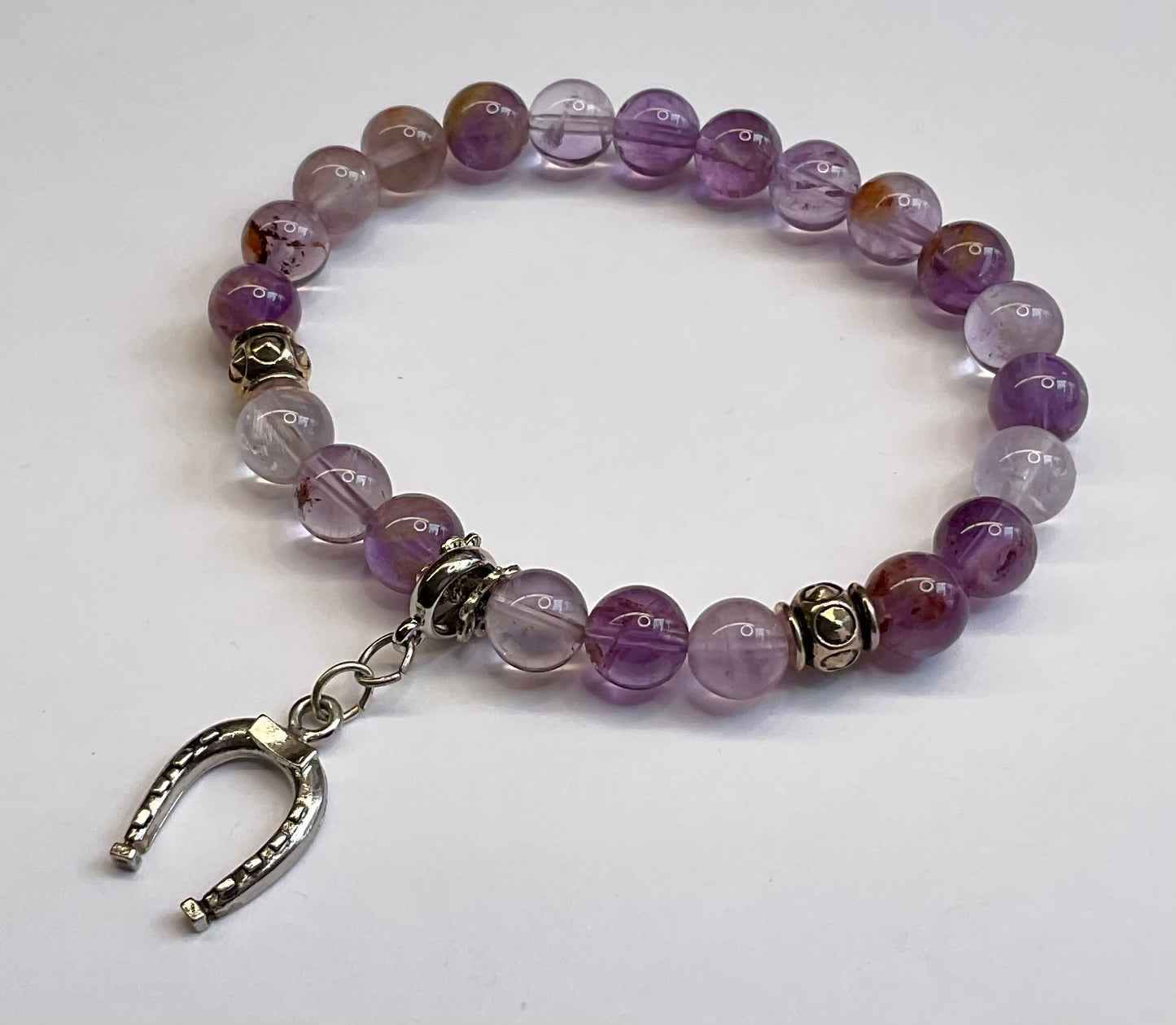 Super Seven with Lucky Horse Shoe Dangle Charrm